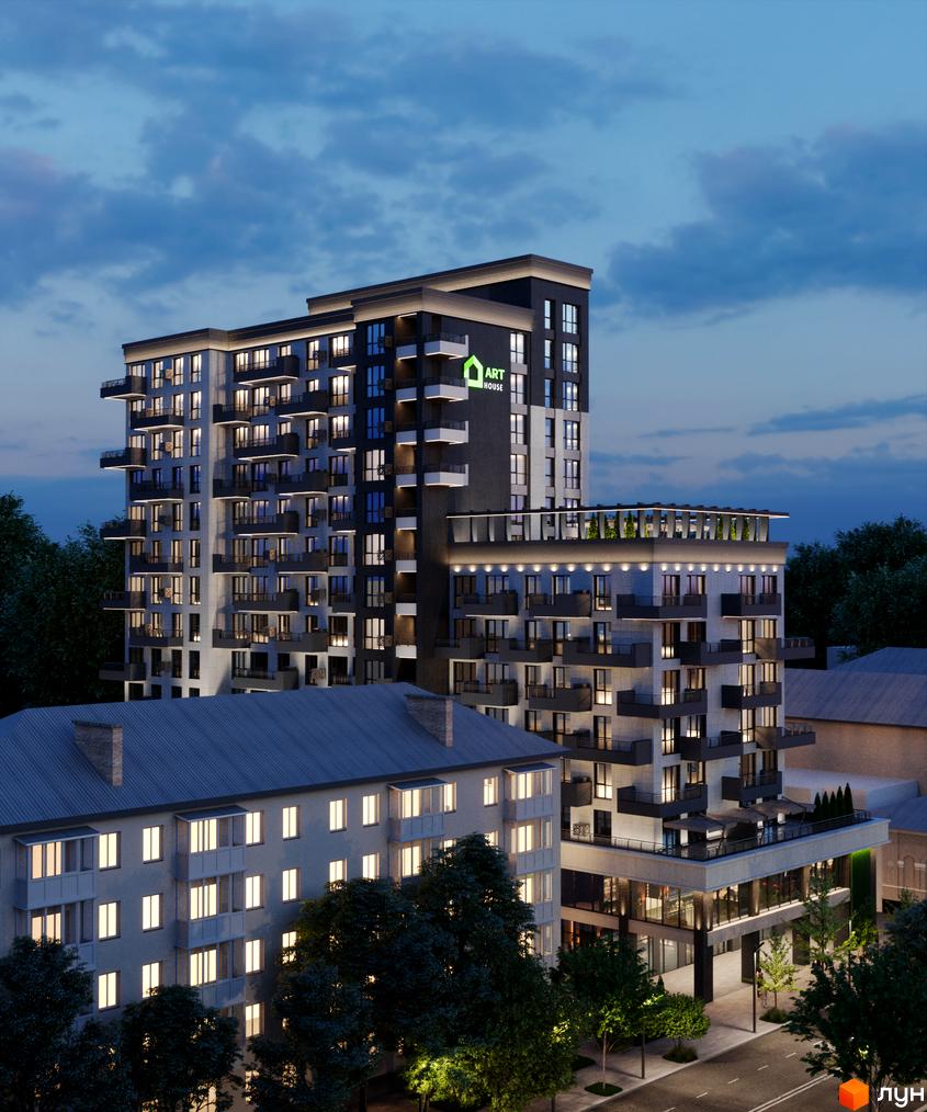 Житловий комплекс Бульвар з багатоповерховою будівлею з темним та світлим фасадами, освітленими вікнами. Навколо розташовані дерева, дорога та старіші будинки.