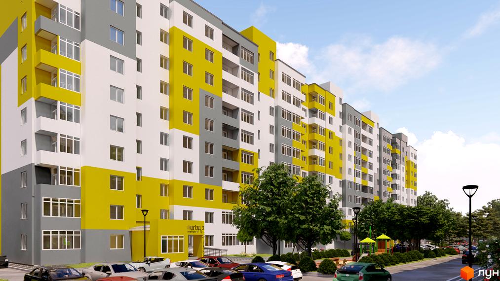 Житловий комплекс Caramel Residence з фасадами біло-жовто-сірого кольору та численними вікнами. На території є паркінг та дитячий майданчик.