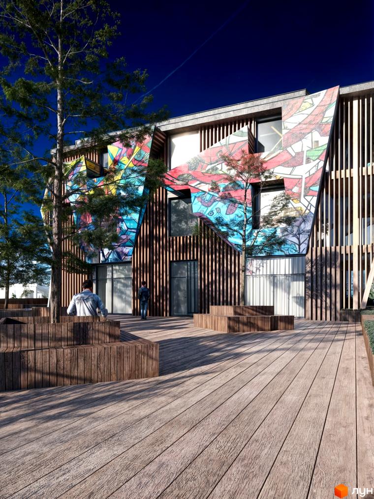 POVOLI Hotel – житловий комплекс з яскравим фасадом та дерев'яною прибудинковою територією з лавами. Зовнішній вигляд будівлі та зона відпочинку.