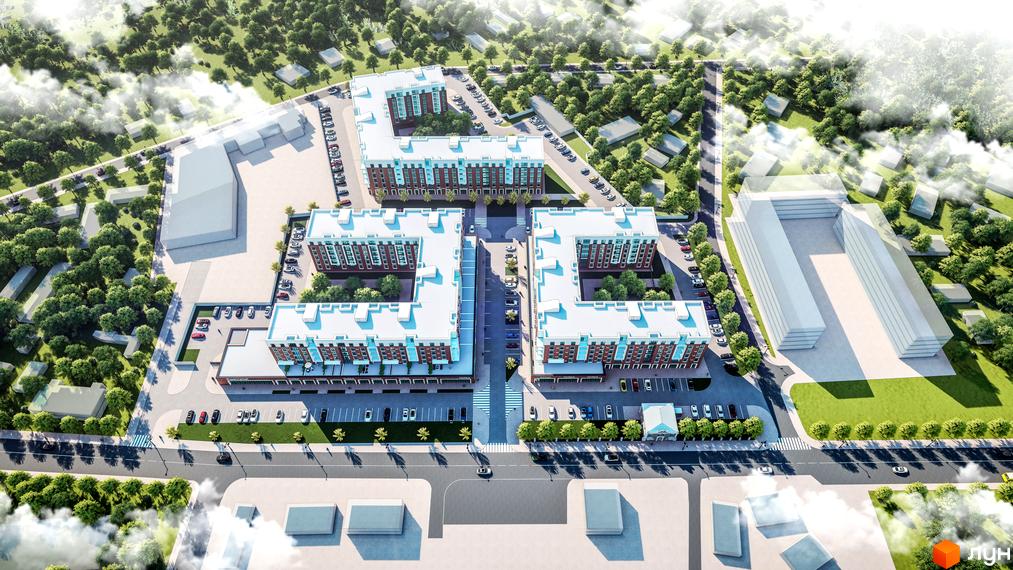 Вид зверху на ЖК Володимир Сіті. Багатоквартирні будинки з червоної цегли з білими дахами, велика прибудинкова територія з парковками та зеленими зонами.