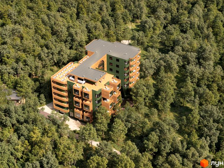 Апарт-готель „Оселія“ серед лісу. Будівля має кілька поверхів з терасами та балконами, навколо багато дерев.