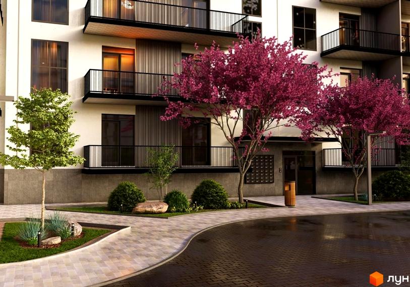 Зовнішній вигляд будинку ЖК Home з балконами та вхідною групою. На прибудинковій території висаджені дерева, є доріжки та зелені насадження.