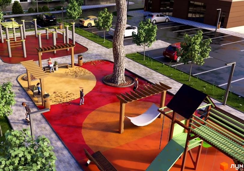 Житловий комплекс Home. Дитячий майданчик з гірками та гойдалками, поруч парковка з автомобілями. На території є лавки для відпочинку.