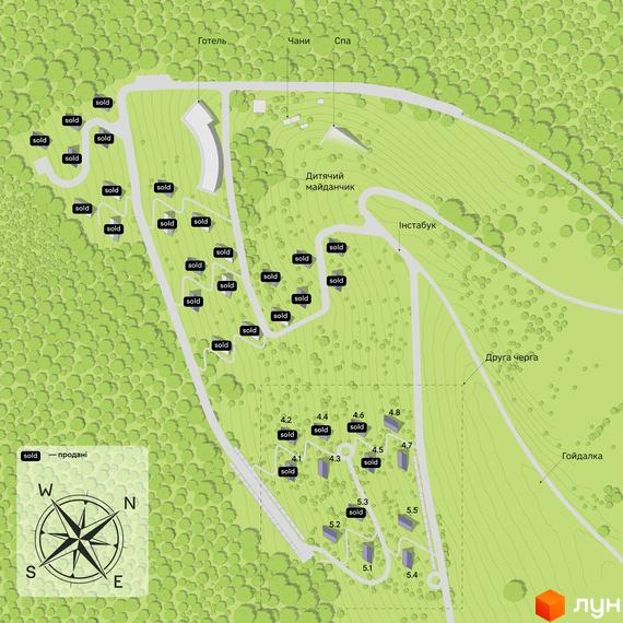 План житлового комплексу УЛІС з позначками проданих будинків та об'єктів інфраструктури, оточений зеленою зоною.