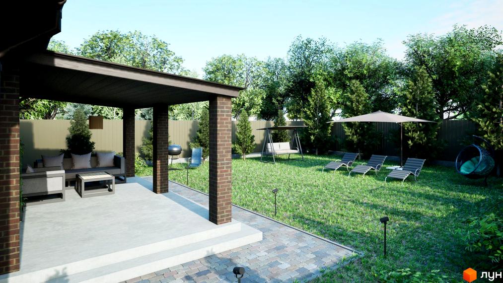 Крита тераса будинку Котеджного містечка Золотий Ключ з цегляними опорами. На задньому дворі зелений газон, зона відпочинку та барбекю.