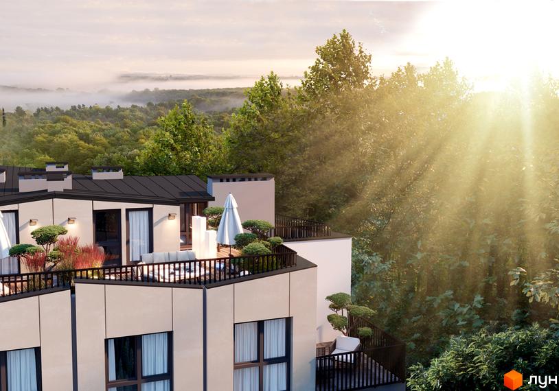 Клубний будинок Forest Etalon Club з терасами та зеленими насадженнями на тлі лісу та туману. Зовнішній вигляд новобудови з елементами ландшафтного дизайну.
