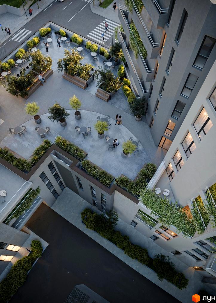 Житловий комплекс MONTREAL з видовими терасами та зеленою прибудинковою територією, де розташовані зони відпочинку.