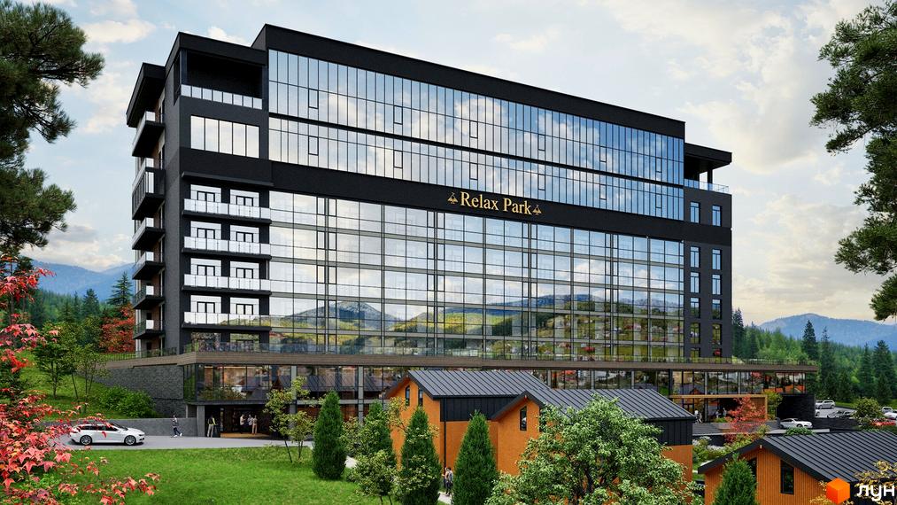 Апарт-готель PHOENIX PLAZA - це сучасна багатоповерхова будівля з панорамним склінням, розташована серед гірського ландшафту. На прибудинковій території видно зелену зону та кілька невеликих будиночків.