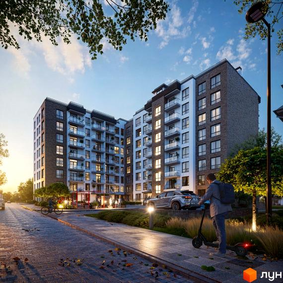 Житловий комплекс Джем 2.0 з цегляним фасадом та скляними балконами, що оточений доглянутою прибудинковою територією з деревами та доріжками.