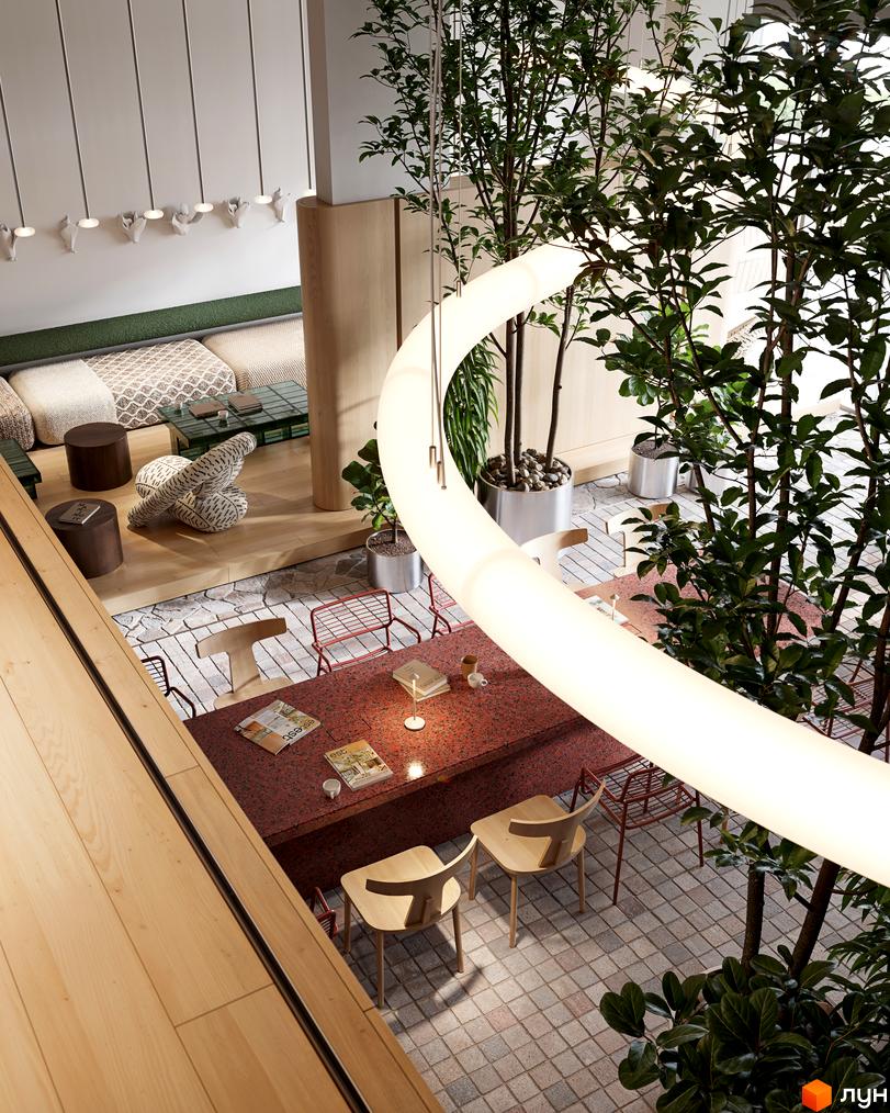 Просторий інтер'єр Житлового комплексу Avalon Magnolia з багатоярусними зонами, зеленими насадженнями та декоративним освітленням.