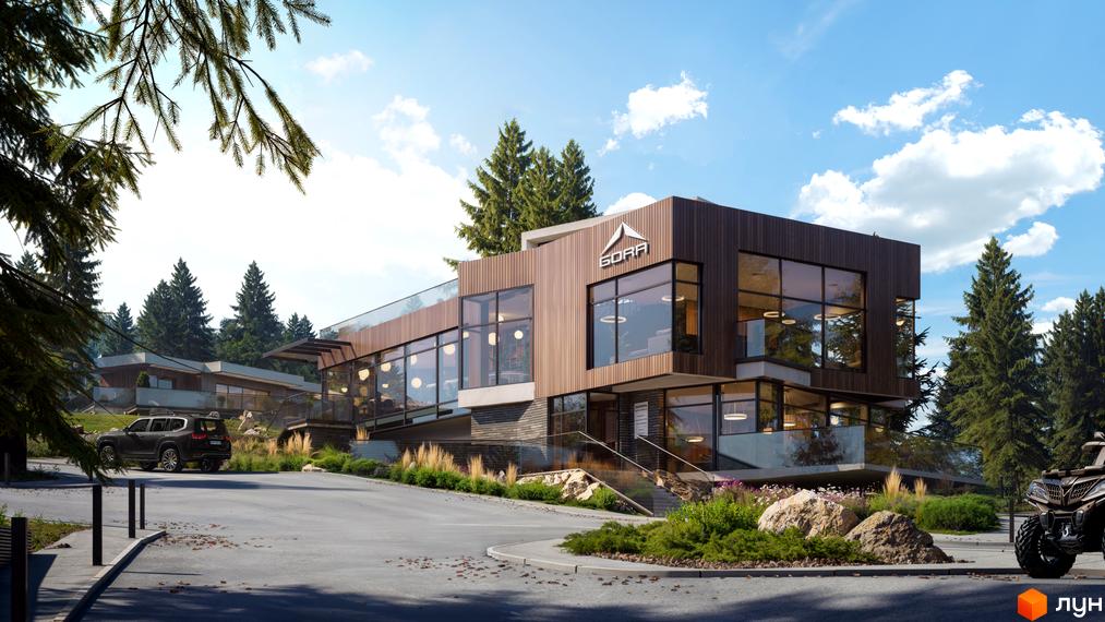 Котеджне містечко GORA з дерев'яним фасадом та великими вікнами, розташоване серед зелених дерев. Біля комплексу видно дорогу та припаркований автомобіль.