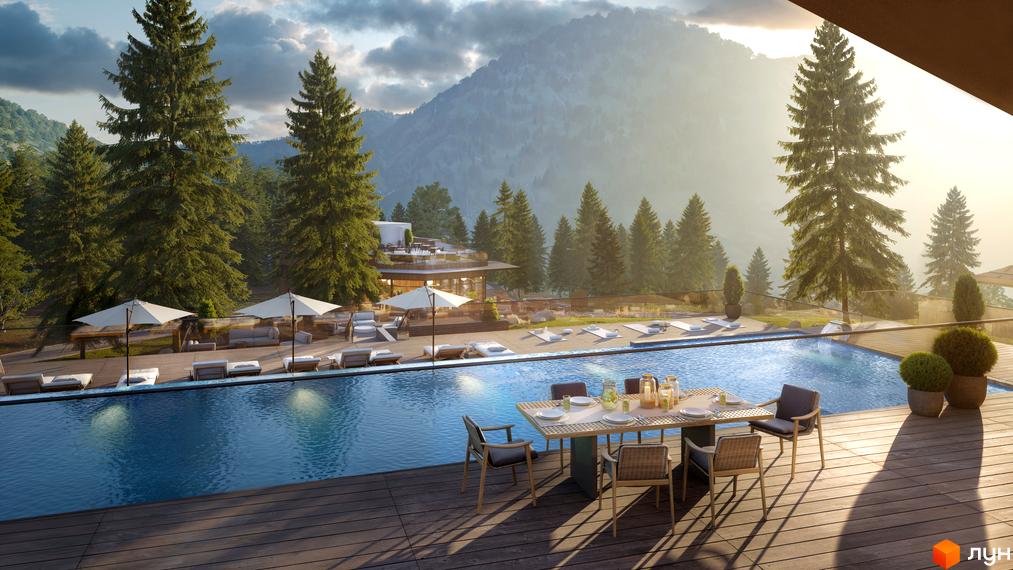 Котеджне містечко GORA з басейном та зоною відпочинку на тлі гірського пейзажу. На території комплексу розташовані дерева та місця для релаксації.