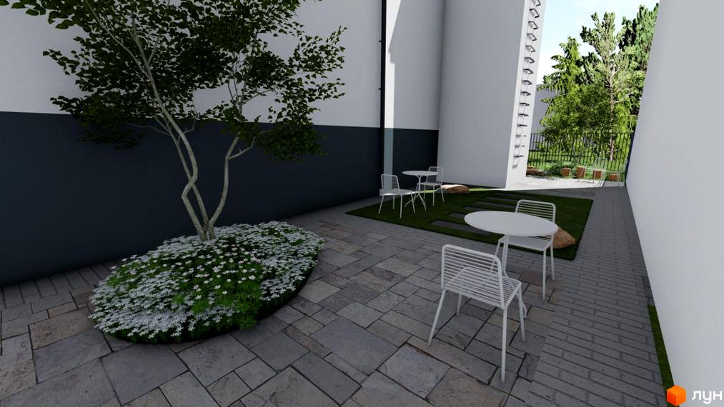 Житловий комплекс Рівна 19. Затишний двір з деревом, квітами та місцями для відпочинку.