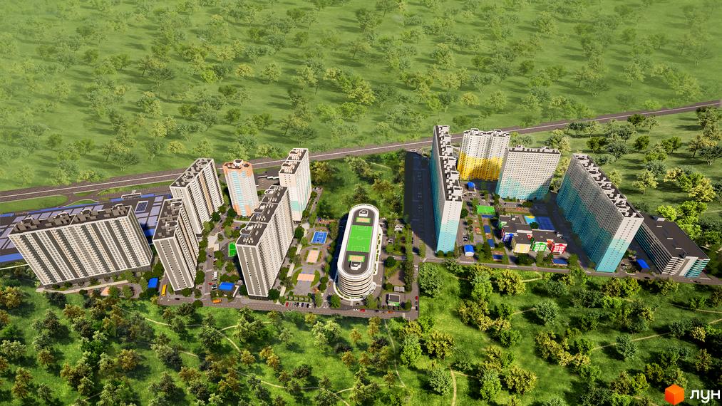 Високі будинки ЖК Одеський бульвар з різнокольоровими фасадами. На території комплексу розташовані спортивні майданчики та зелені зони.