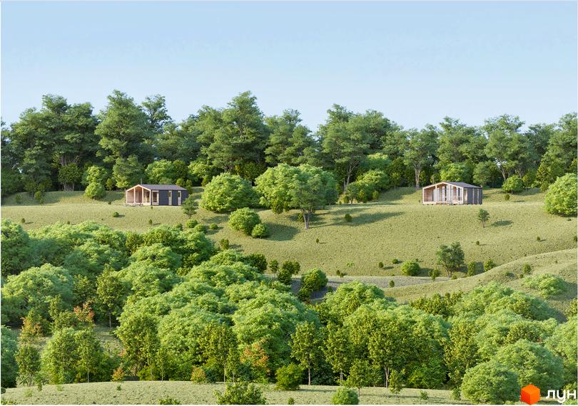 Котеджне містечко КМ УЛІС Віняви: два сучасних будинки на схилі пагорба серед зелені. Навколо будинків – доглянута галявина та дерева.