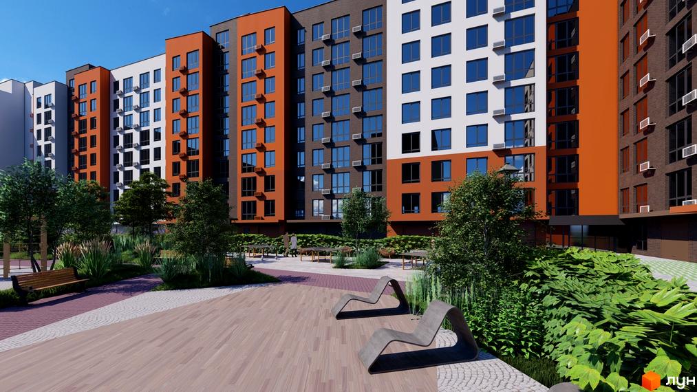 Зовнішній вигляд багатоповерхового будинку в Житловому комплексі Перлина Проскурова-5 з облаштованою прибудинковою територією.