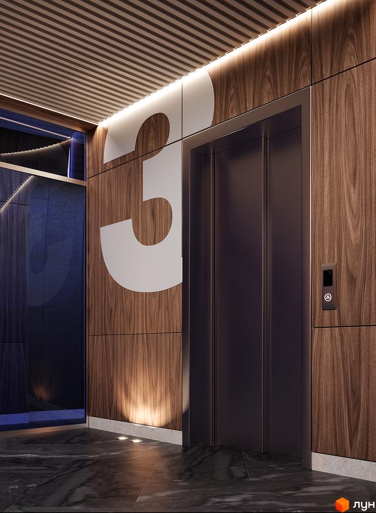 Сучасний ліфт у житловому комплексі CONTINENT REST з дерев'яним оздобленням стін та підсвіткою.