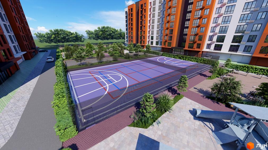 Зображення Житлового комплексу Перлина Проскурова-5 з баскетбольним майданчиком у дворі та багатоповерховим будинком на задньому плані.