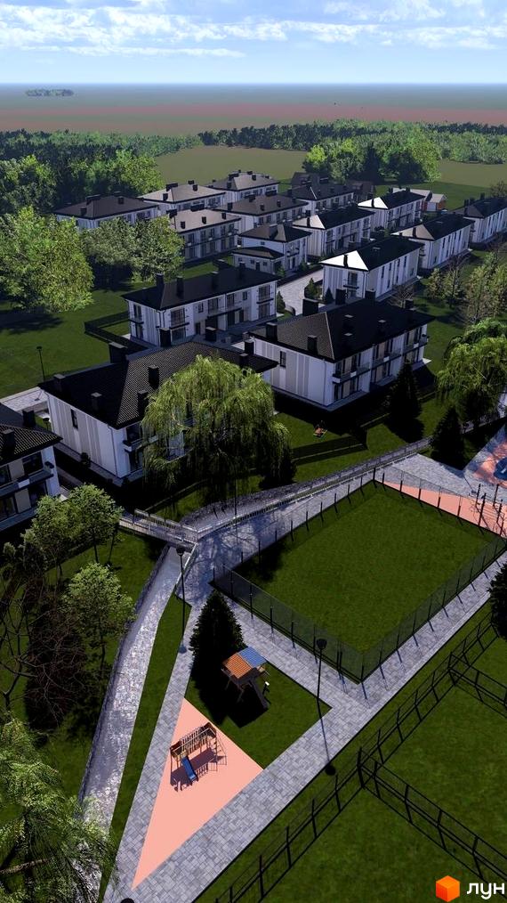 Котеджне містечко КМ Нові Вовчинці: сучасні будинки з чорними дахами та прибудинкова територія зі спортивним майданчиком та дитячою зоною.