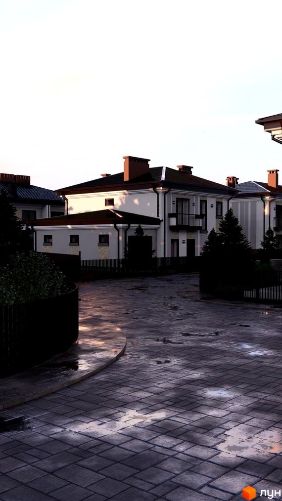 Котеджне містечко Нові Вовчинці: фасади будинків з коричневими дахами та димарями, огороджена територія з бруківкою та зеленими насадженнями.