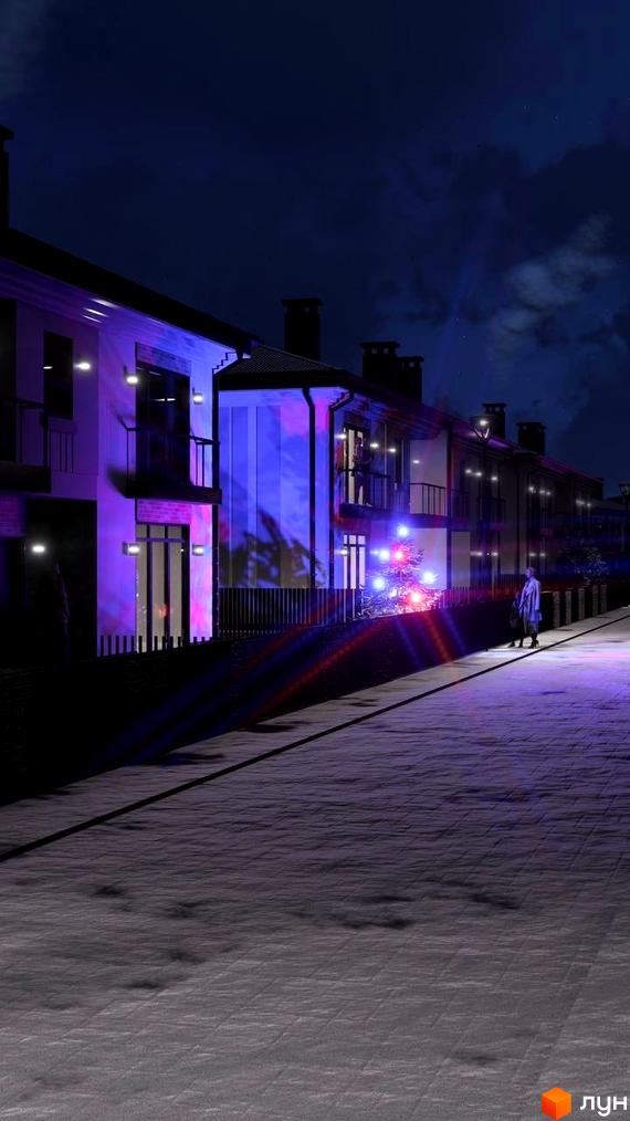 Котеджне містечко КМ Нові Вовчинці вночі з підсвіченими фасадами та новорічною ялинкою на території. Прибудинкова територія освітлена ліхтарями та святковими вогнями.