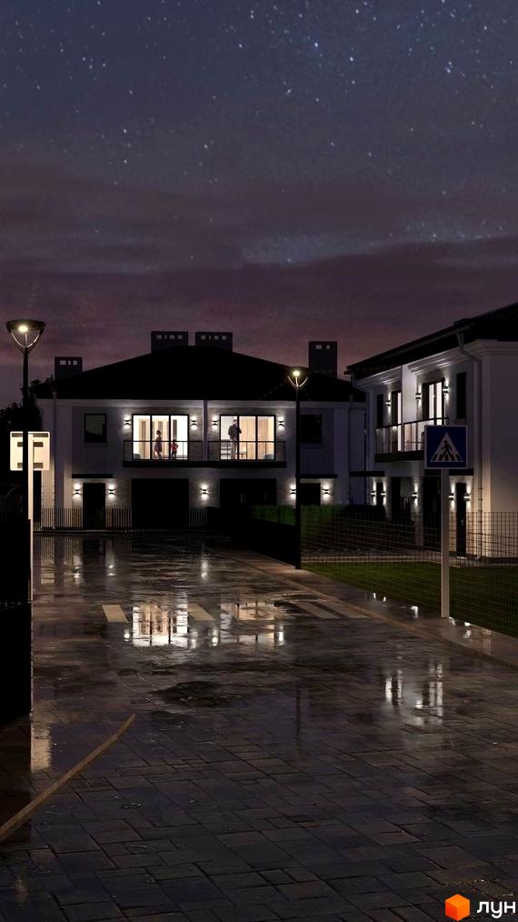 Котеджне містечко Нові Вовчинці: двоповерхові будинки з балконами та підсвіткою вночі, з відображенням світла на мокрій бруківці.