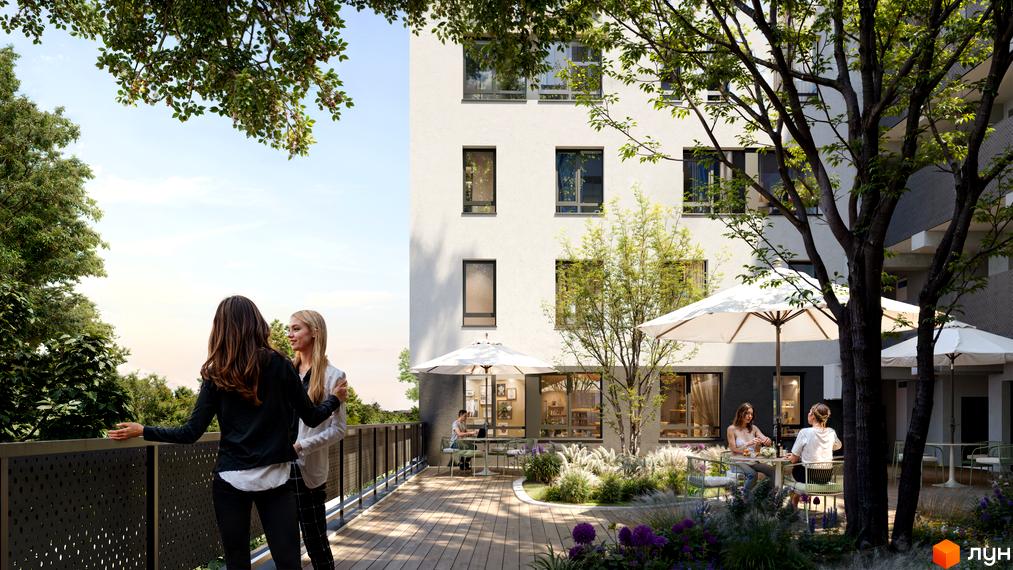 Зображення фасаду та прибудинкової території Житлового комплексу BIG BEN. На території є місця для відпочинку.