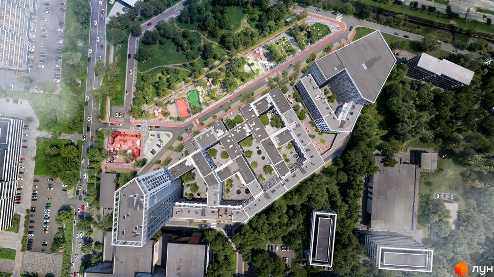 Вигляд з висоти на Житловий район BIG BEN: багатоповерхові будинки з внутрішніми дворами, зелені насадження, дороги та паркінги.