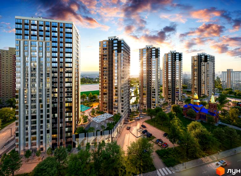 Високі будинки ЖК Polar Park з панорамними вікнами на тлі заходу сонця. На території комплексу є парковка, зелені насадження та дитячий майданчик.