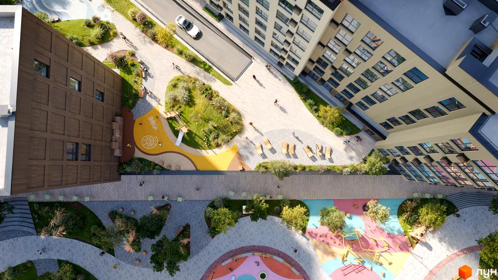Житловий комплекс Brother: вид зверху на будівлі з коричневим та бежевим фасадом, зелену прибудинкову територію з дитячими майданчиками та зонами відпочинку.