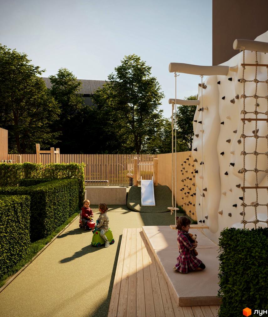 Дитячий майданчик житлового комплексу HARRY з ландшафтним дизайном та ігровими елементами для дітей. На території комплексу розташовані зелені зони та безпечні ігрові зони.