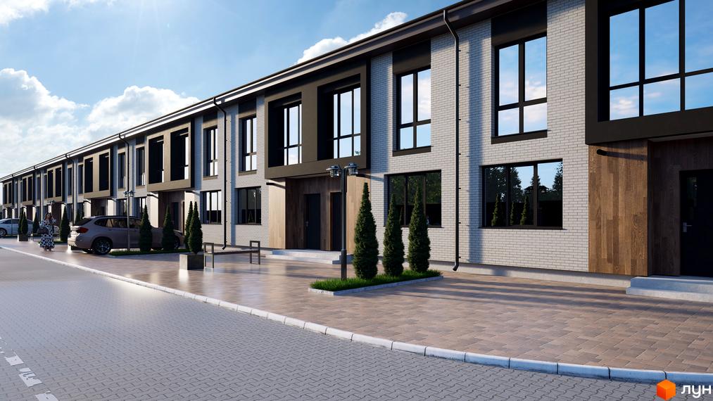 Таунхауси Eurovillage: ряд двоповерхових будинків зі світлої цегли та темними вікнами. Прибудинкова територія облаштована бруківкою та зеленими насадженнями.