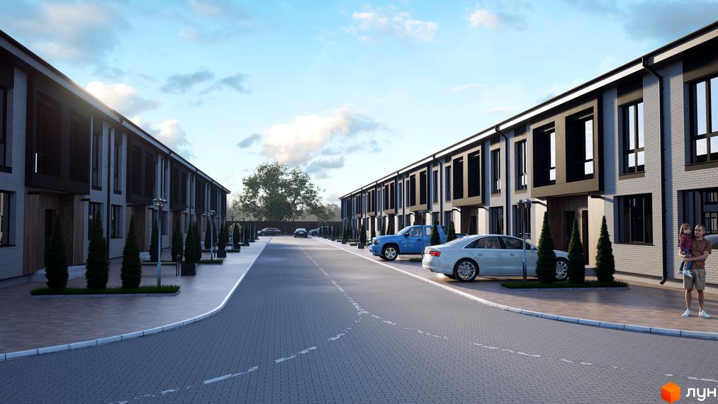 Таунхауси Eurovillage з сірої цегли з чорними елементами фасаду та прибудинковою територією з паркуванням та озелененням.