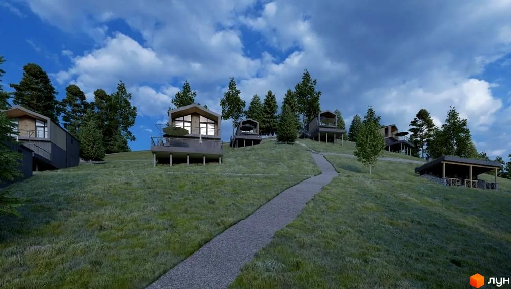 Котеджне містечко Genesis Mountain з індивідуальними будинками на схилі пагорба серед дерев. Навколо зелена трава та доріжка.