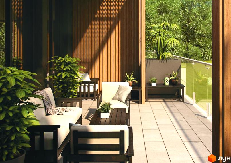 Тераса Житлового комплексу OZONE з дерев'яними стінами, садовими меблями та великою кількістю зелені, що виходить на лісопаркову зону.
