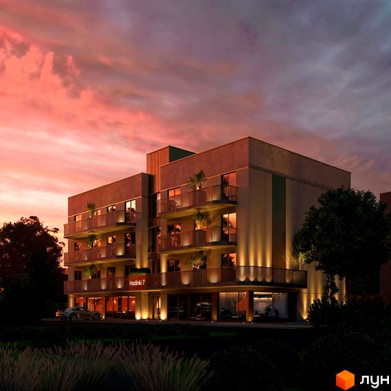 Житловий комплекс Годинки, 7. Сучасна архітектура будівлі з балконами та освітленням на фоні вечірнього неба. Прибудинкова територія з деревами та газоном.