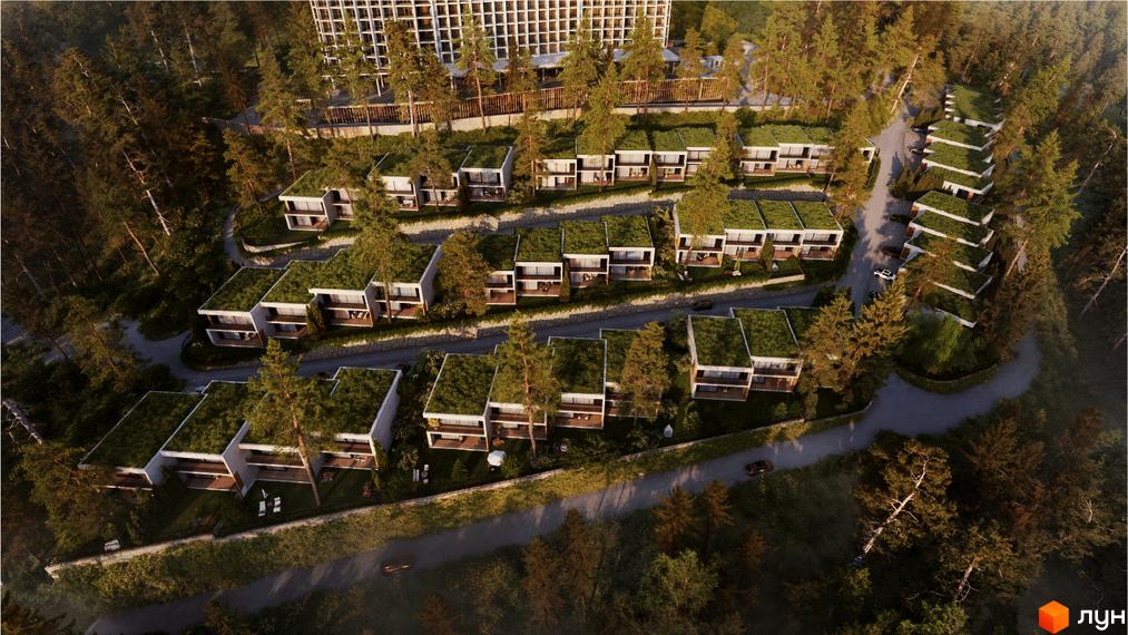 Котеджне містечко Mountain Residence premium villas&spa з зеленими дахами та терасами, розташоване серед лісу. Навколо комплексу доглянута територія з деревами та доріжками.