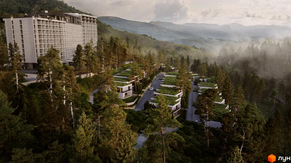 Котеджне містечко КМ Mountain Residence premium villas&spa з сучасними будинками та зеленими дахами, розташоване серед гір та лісу.