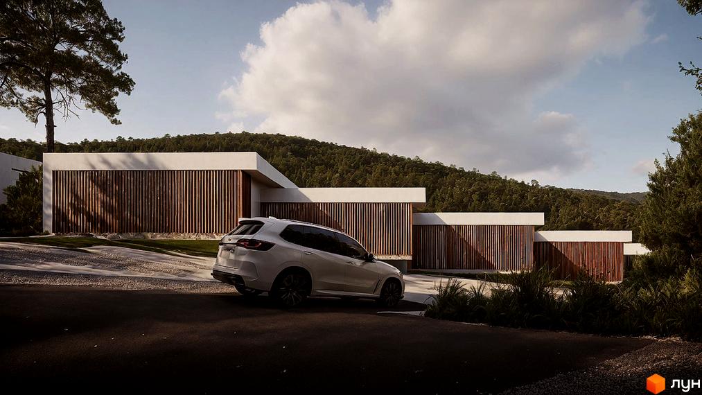 Котеджне містечко КМ Mountain Residence premium villas&spa з білим фасадом та дерев'яними елементами, розташоване серед зелених пагорбів.