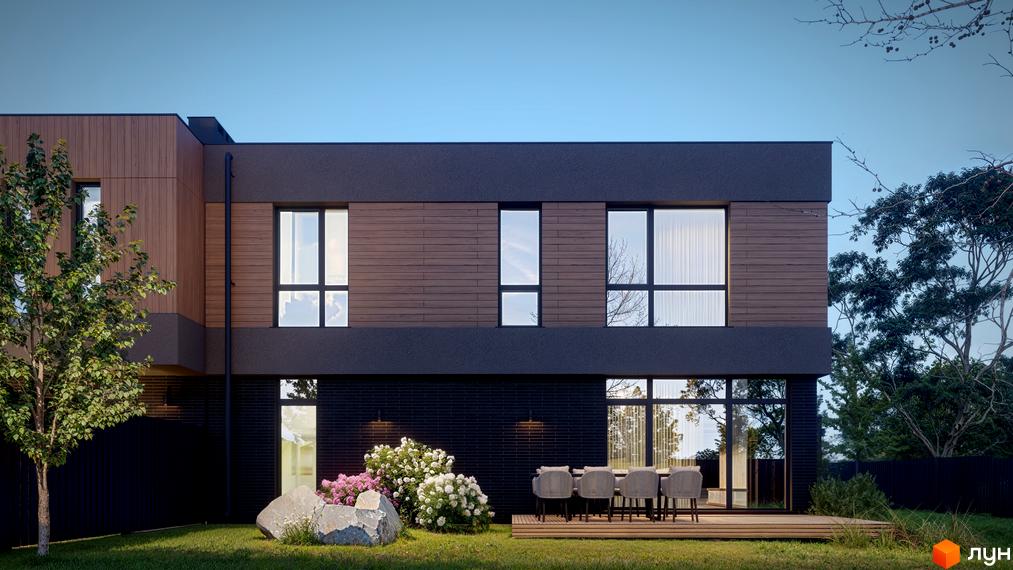 Фасад будинку Котеджного містечка AtHome з темними та дерев'яними елементами, великими вікнами. На передньому плані зелений газон, тераса та квітучі кущі.