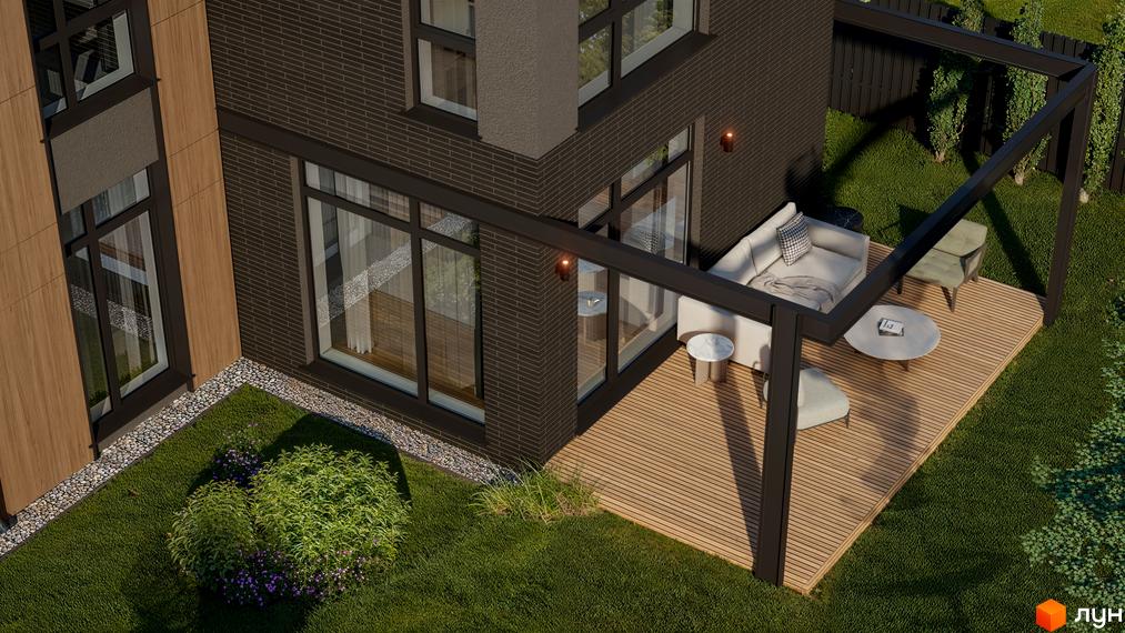 Будинок Котеджного містечка AtHome з темної цегли та великими вікнами. Поруч дерев'яна тераса з перголою та зелений газон.