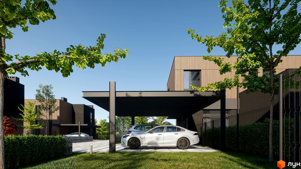 Фасад будинку з дерев'яним оздобленням, терасою та двома автомобілями під навісом. Навколо будинку зелена трава, дерева та огорожа.