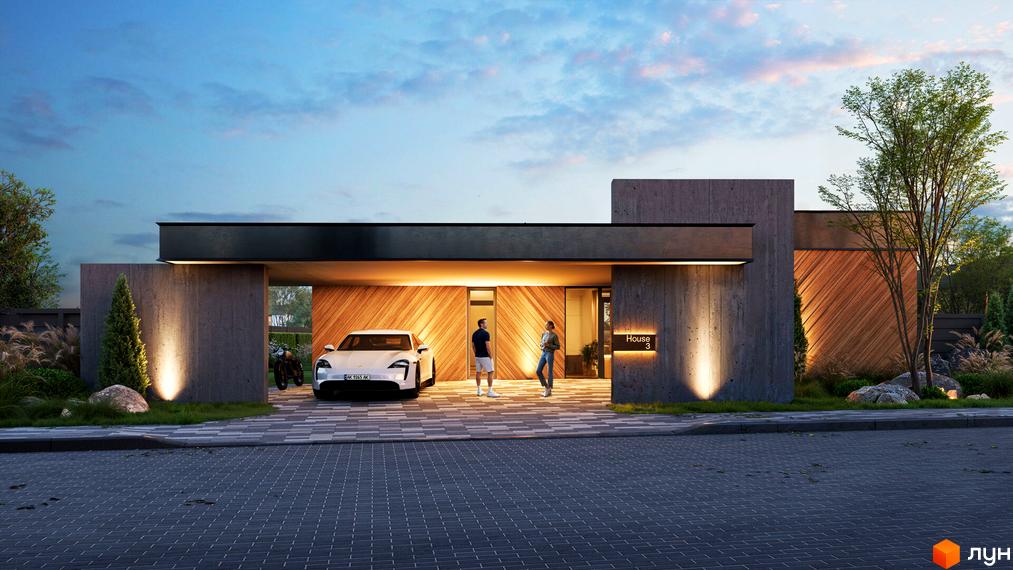 Котеджне містечко Piemont eco village: будинок з комбінованим фасадом з бетону та дерева, з підсвіченим входом. Навколо будинку викладена бруківка та ростуть дерева.