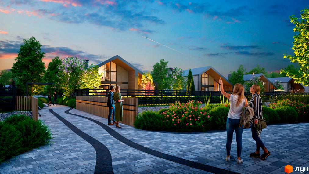 Котеджне містечко КМ Piemont eco village з сучасними будинками та доглянутою прибудинковою територією з квітами та деревами.