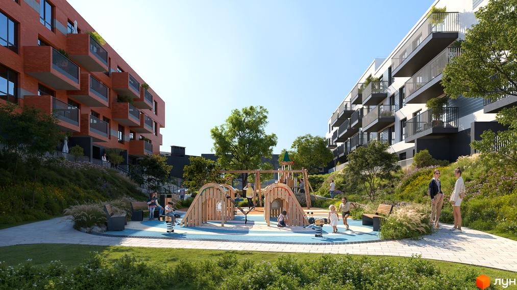 Житловий комплекс Greenville Prostir з цегляним фасадом та балконами, дитячий майданчик з гірками та гойдалками на прибудинковій території.