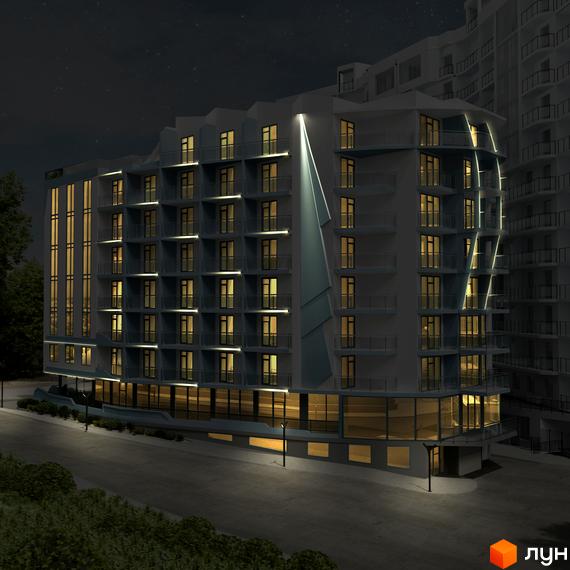 Апарт-комплекс Breeze Marine: багатоповерховий будинок з фасадною підсвіткою вночі. Перед ним дорога з ліхтарями та зелені насадження.