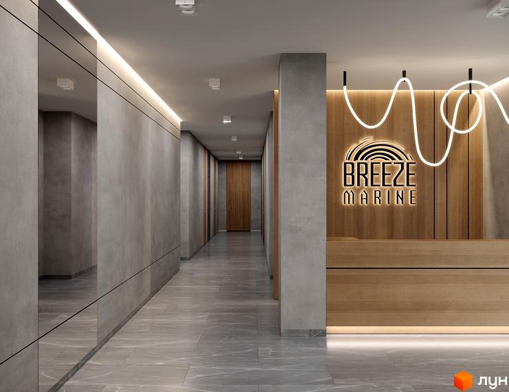 Інтер'єр лобі Апарт-комплексу Breeze Marine: рецепція з підсвіткою, неоновий декор та дзеркальні панелі на стінах.