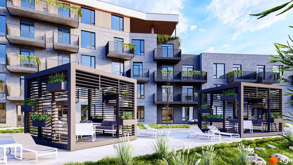 Зовнішній вигляд житлового комплексу Статус Парк з цегляним фасадом та балконами. Прибудинкова територія з альтанками та зонами відпочинку.