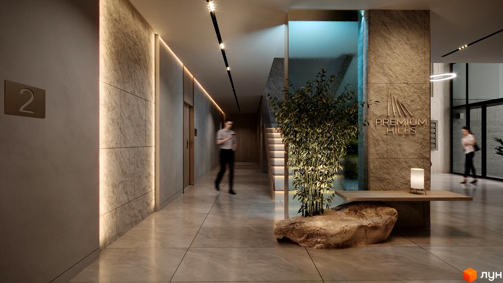 Сучасний хол житлового комплексу PREMIUM HILLS з елементами дизайну та рослинністю. Привабливий інтер'єр лобі новобудови.