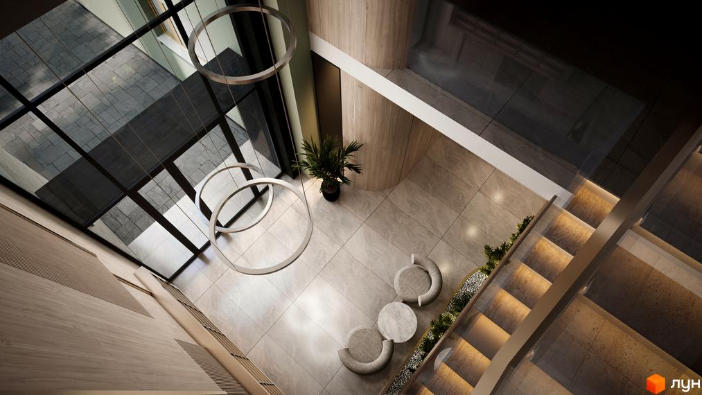Інтер'єр холу житлового комплексу PREMIUM HILLS з великими вікнами, дизайнерськими меблями та підсвіченими сходами. Сучасна новобудова з елегантним дизайном.